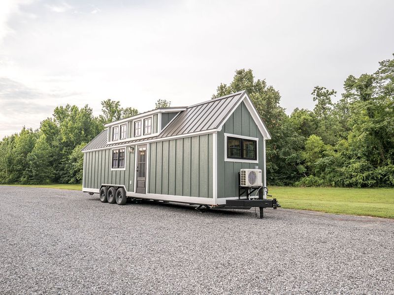 Brand new Timbercraft Teton model 2 bedroom handcrafted tiny home on wheels!