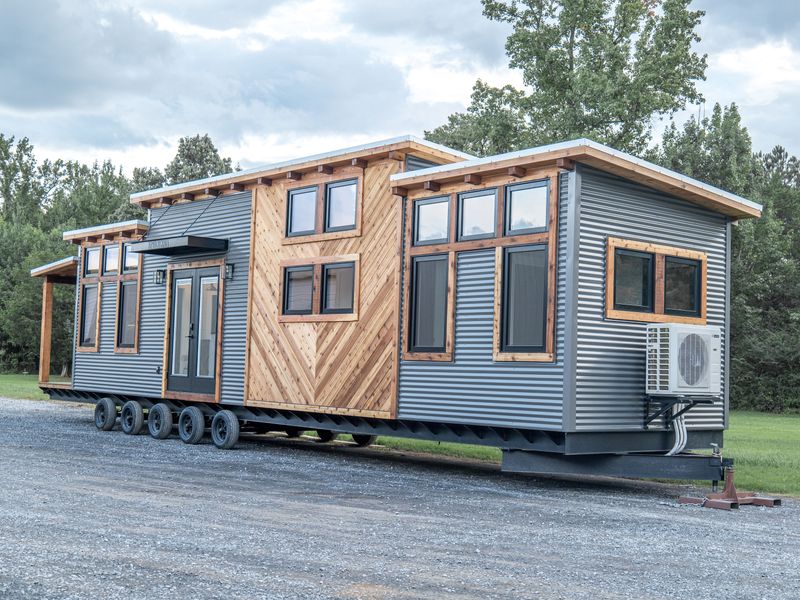 Timbercraft Big Sky model is a modern rustic and luxurious tiny home park model! image 1