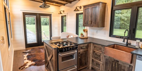 Timbercraft Big Sky model is a modern rustic and luxurious tiny home park model! image 4