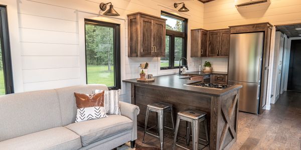 Timbercraft Big Sky model is a modern rustic and luxurious tiny home park model! image 3