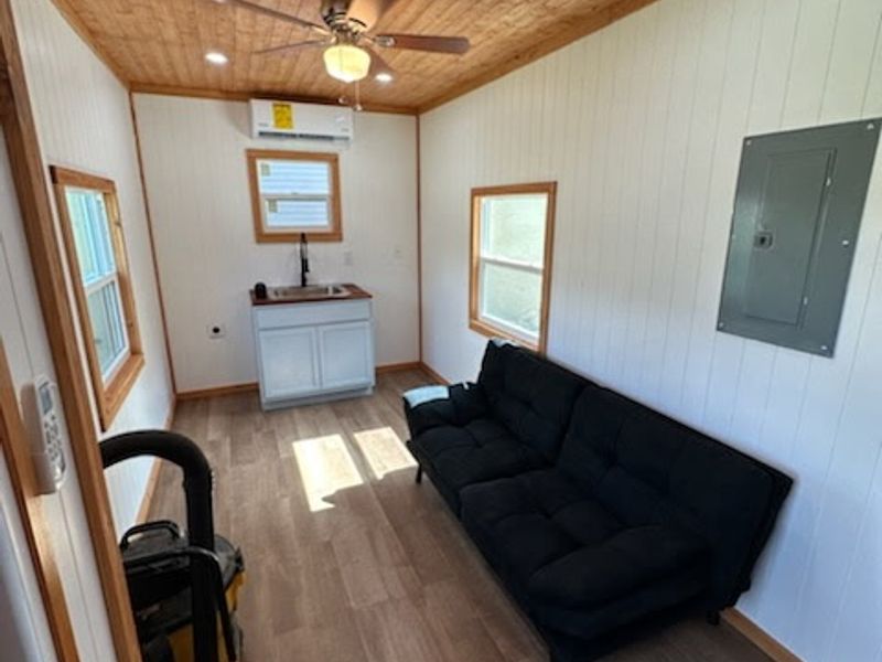 Off-Grid Ready- One-Level Tiny Home for Sale | Main Floor Bedroom image 1