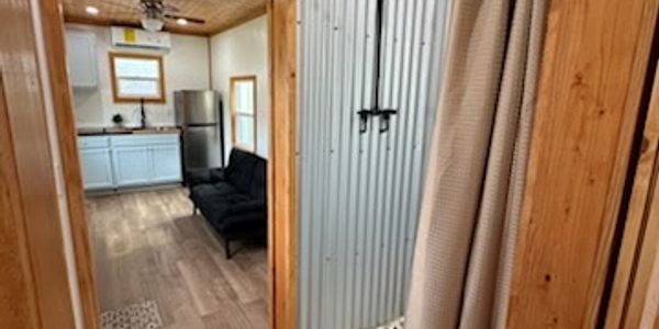 Off-Grid Ready- One-Level Tiny Home for Sale | Main Floor Bedroom image 4
